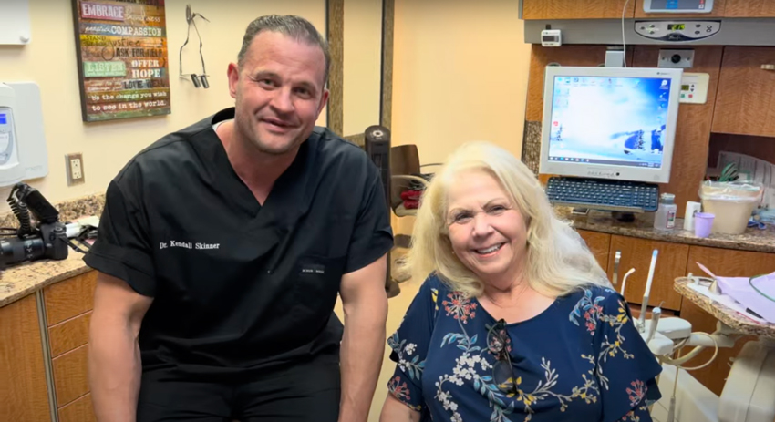 Dr. Skinner with patient.